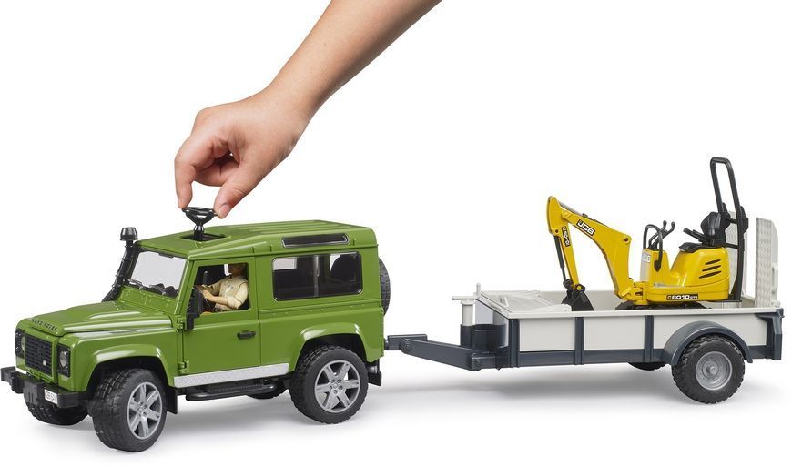 Іграшковий автомобіль "Land Rover Defender" з причіпом, мікро-екскаватором "JCB" та фігуркою 02593 фото